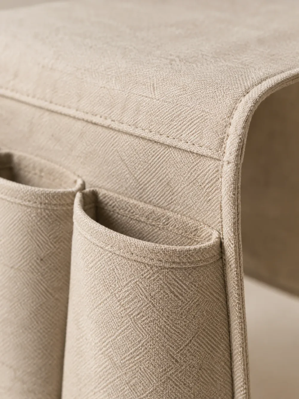 Arm Sofa Caddy in Oat, close-up of the seams and handle