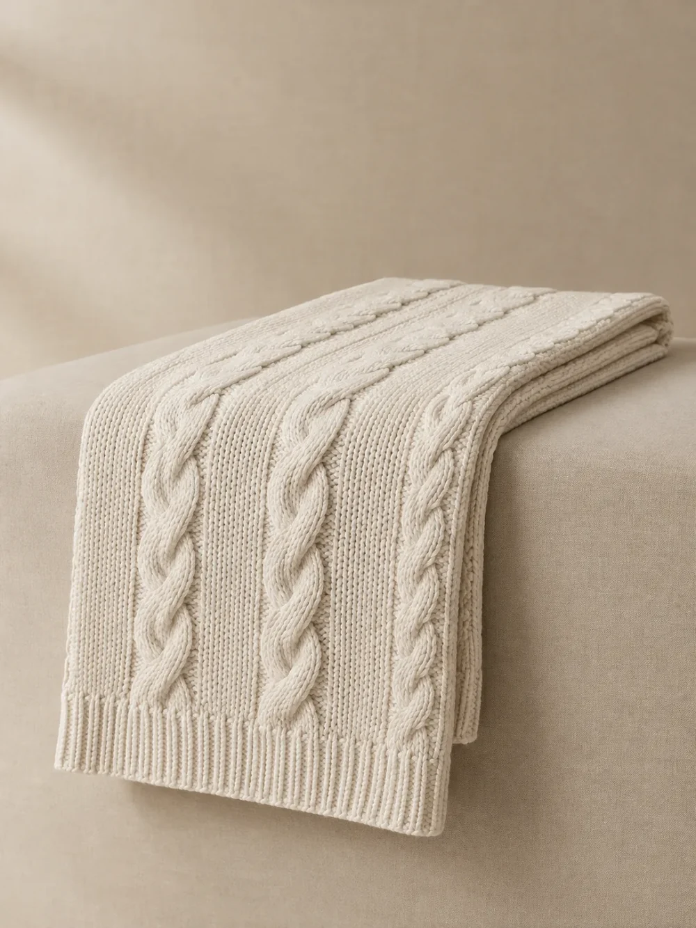 Brae Cable Knit Runner in Chalk, folded, showing the edge finish