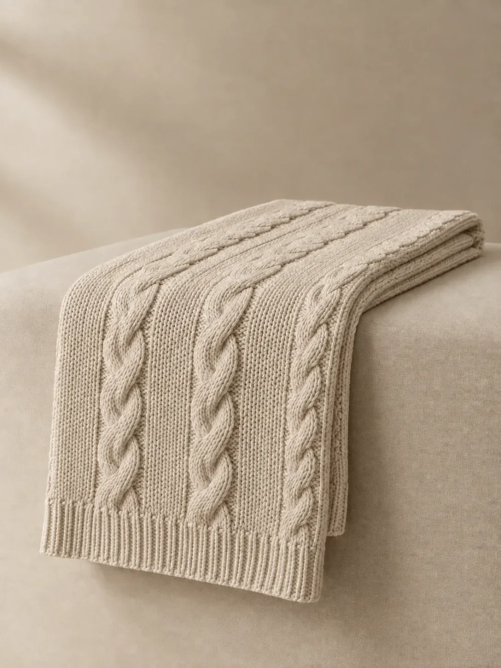 Brae Cable Knit Runner in Oat, folded, showing the edge finish