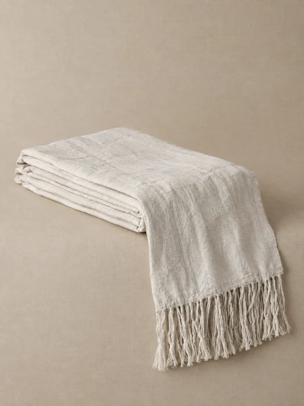 Drift Fringe Bed Runner in Chalk, folded, showing the edge finish