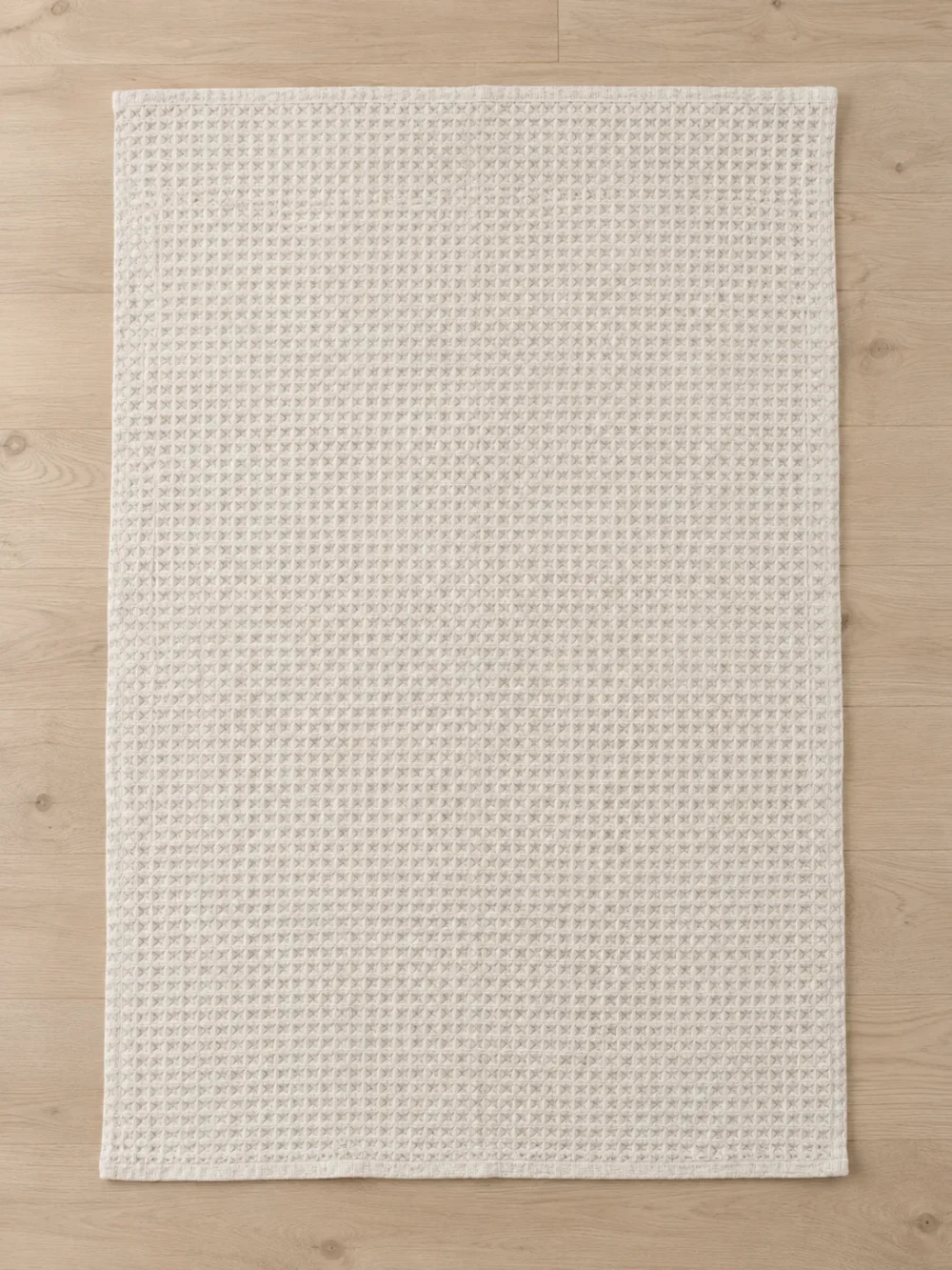 Ebb Waffle Throw in Chalk, laid flat, full size
