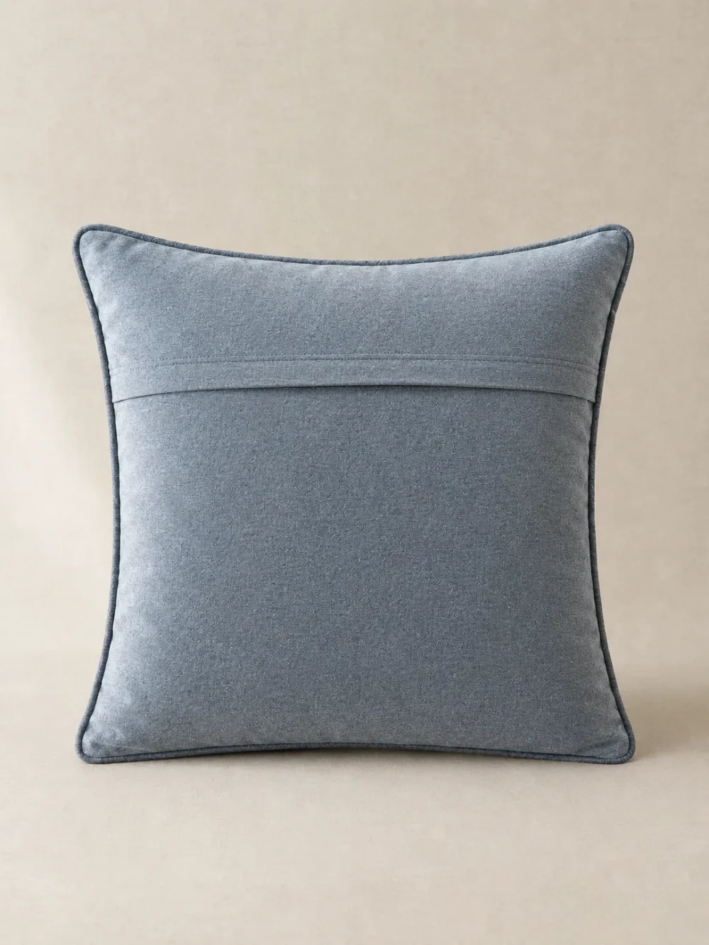 Hush Piped Cushion Cover in Mist, back view showing the closure