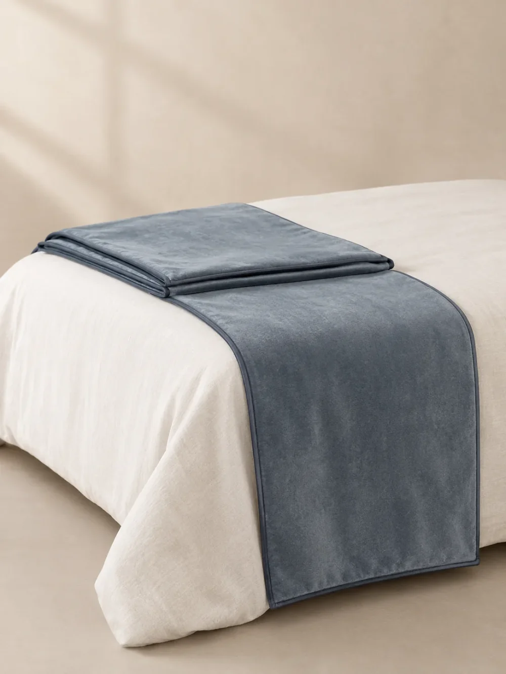 Hush Velvet Bed Runner in Mist, folded, showing the edge finish