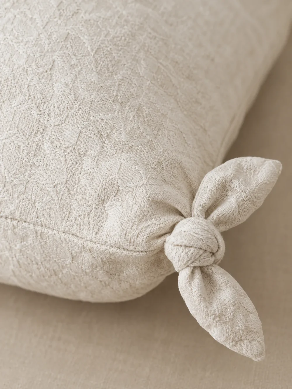 Skerry Knot Cushion Cover in Chalk, close-up of the weave and edge