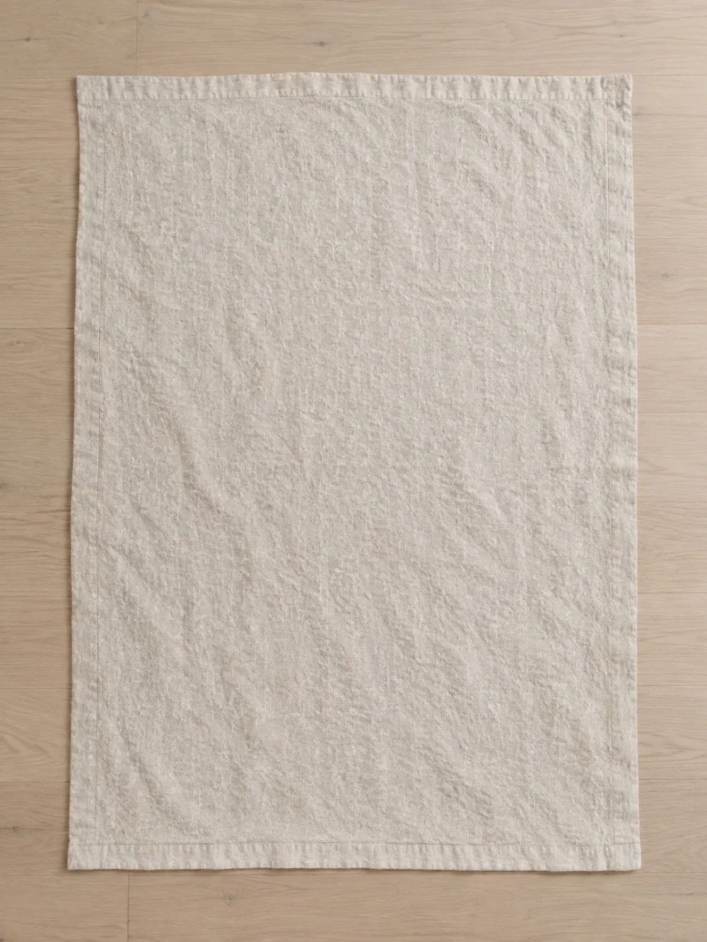 Skerry Stonewashed Linen Throw in Chalk, laid flat, full size