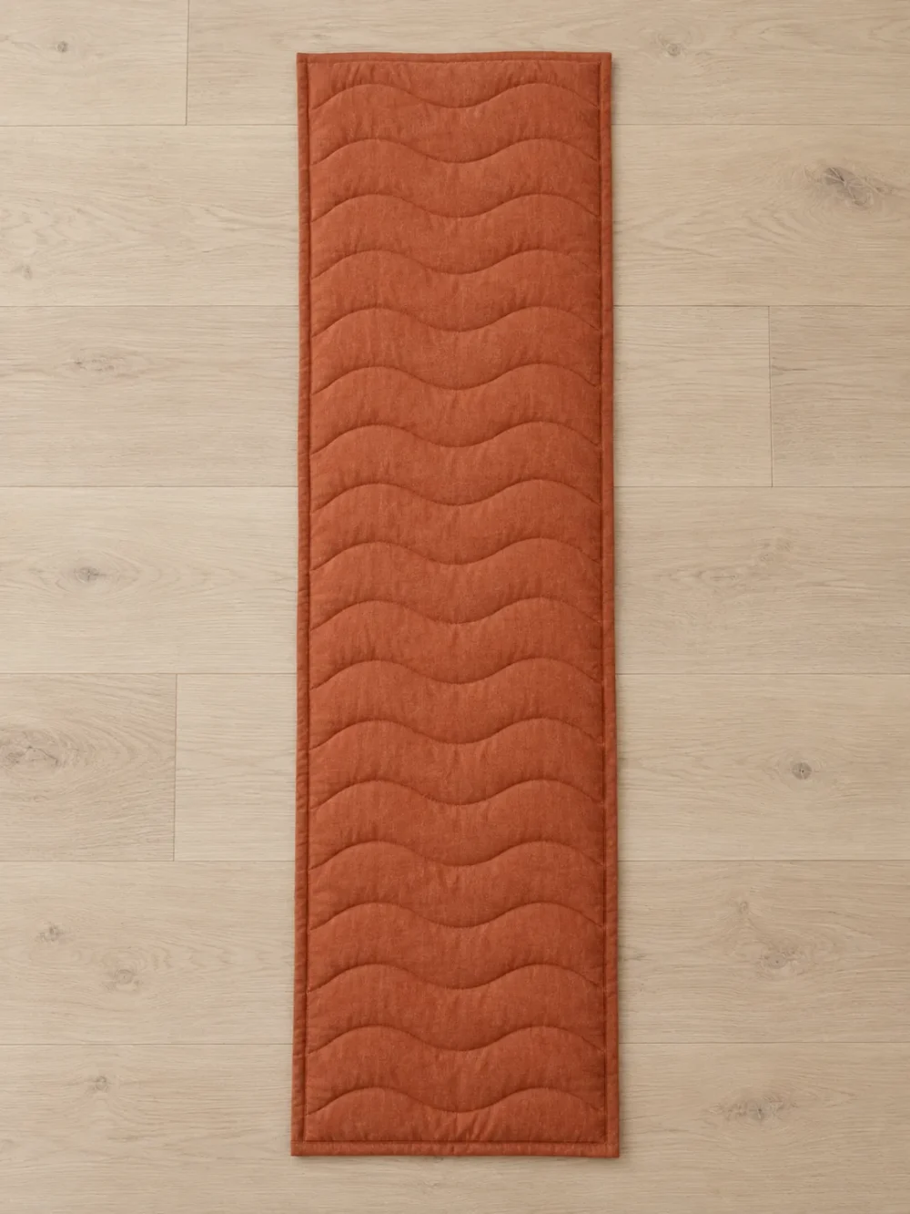 Swell Quilted Bed Runner in Clay, laid flat, full length