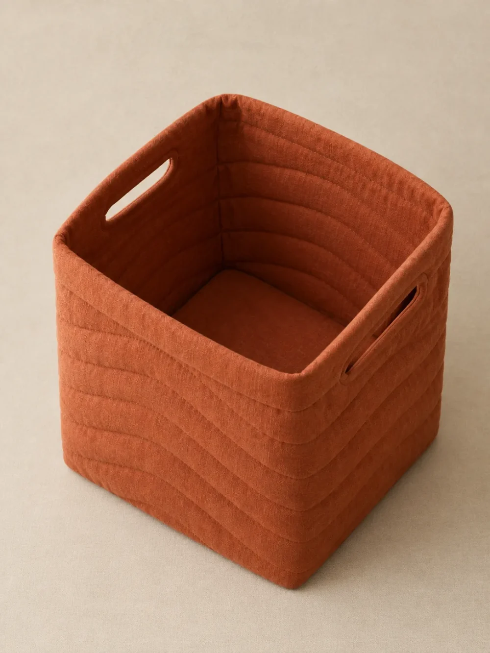 Swell Quilted Storage Bin in Clay, seen from above