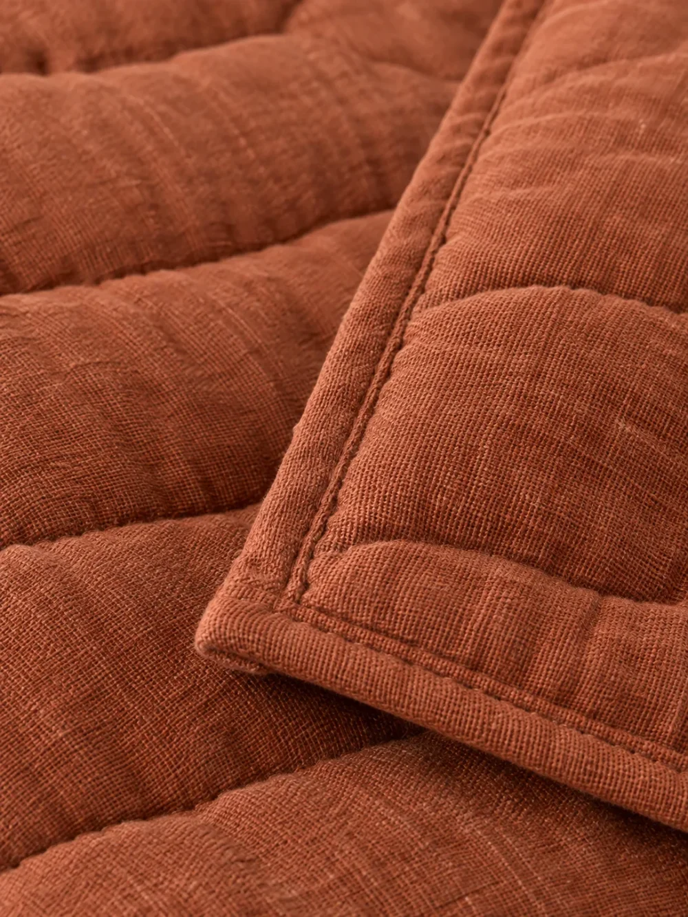 Swell Quilted Throw in Clay, close-up of the weave and edge